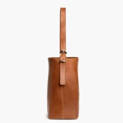 Bucket Bag | Saddle 15 Bucket Bag | Saddle -Thursday Boots 1024x1024 Women BucketBag Saddle 091024 Side dd53cfca 8294 40c6 8dd1 12110e8b22fd